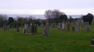 View across Dysart Cemetery, Fife,  towards Firth of Forth